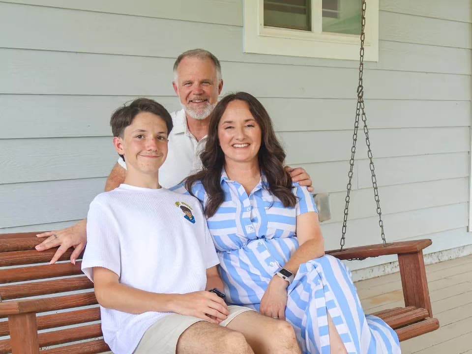 Photographs dissolving one into the next: the Candy Khota'd family on their porch swing, the Tontitown listing's kitchen, a bag of Joyhouse coffee on a rail above a golf course, and a teenager among grapevines.
